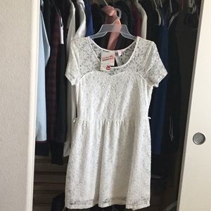 Very cute white dress. Still has tags! Send offers
